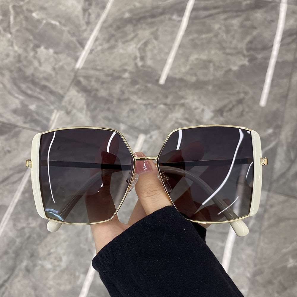 Dame oversized solbriller med glamorøs ramme Skanto