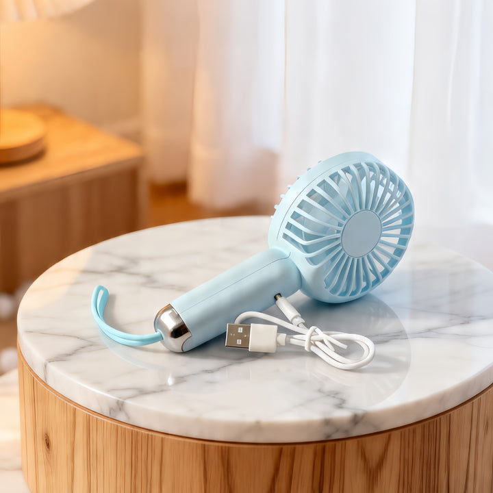 Dame bærbar mini-vifte med USB-ladefunksjon og ergonomisk design Skanto