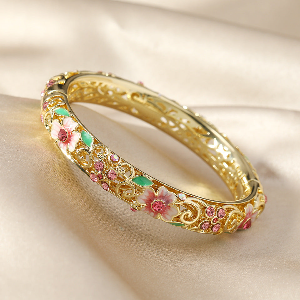 Skanto | 14k diamant aksentert blomster armbånd