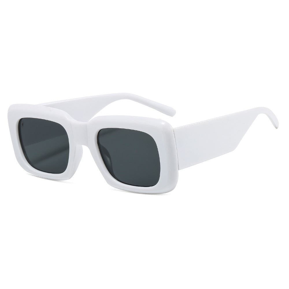 Dame oversized solbriller med kvadratisk ramme og transparent design Skanto
