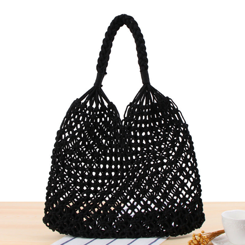 Handbag made of robust hand-knotted net material Skanto