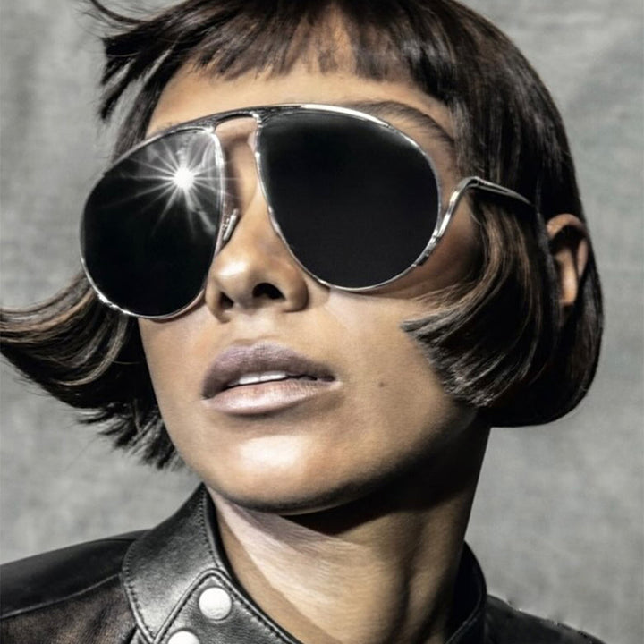 Dame moteriktig pilot-solbrille med polariserte linser og elegant metallramme Skanto