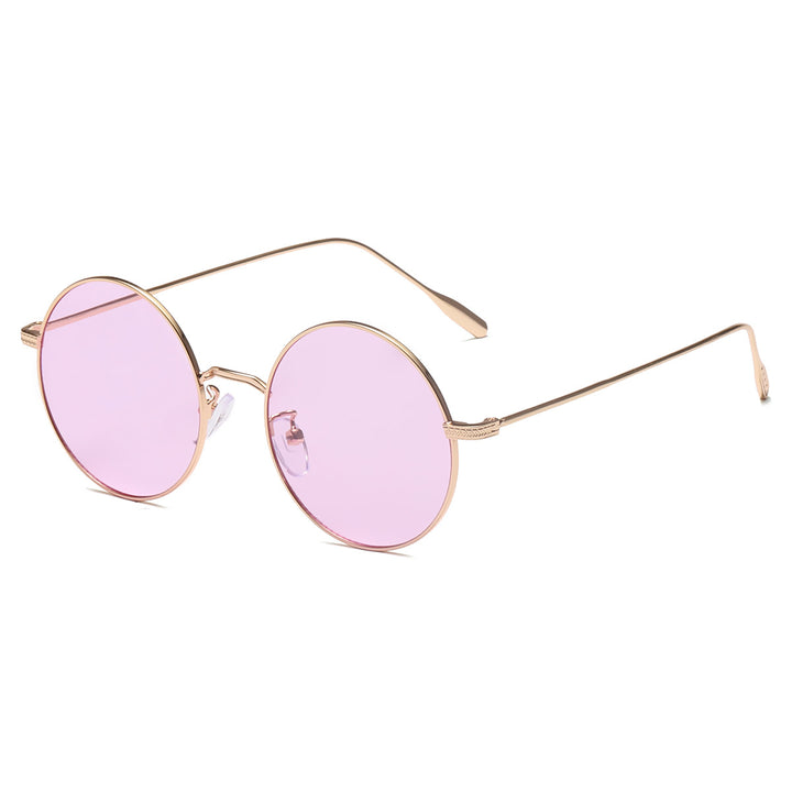 Dame rund solbrille med elegant metallramme og polarisert glass Skanto