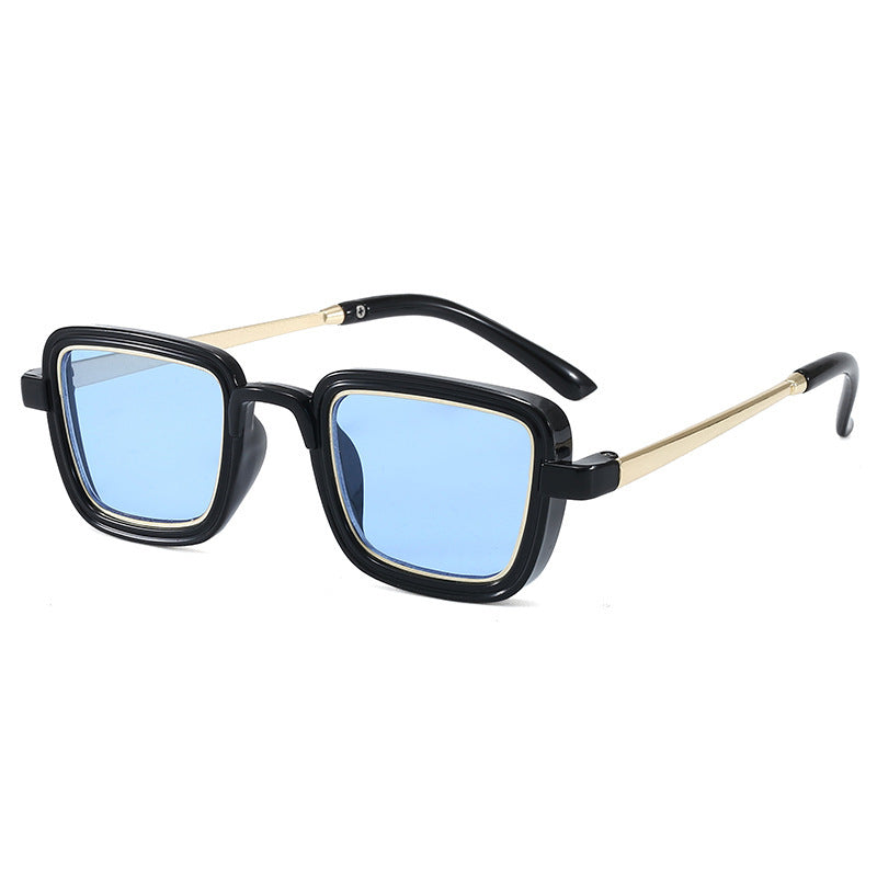 Dame firkantet solbrille med gjennomsiktig ramme og gyldne detaljer Skanto