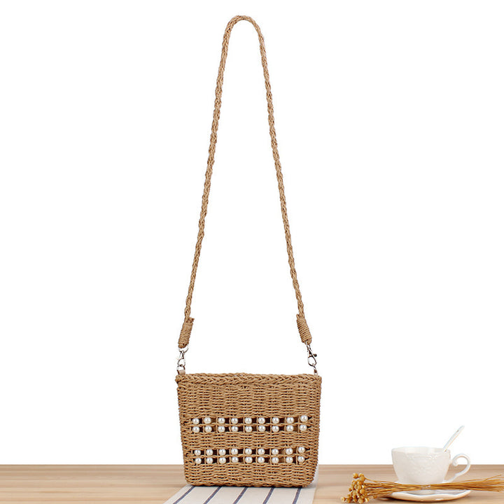 Handbag made of hand-woven natural material with bead decoration Skanto