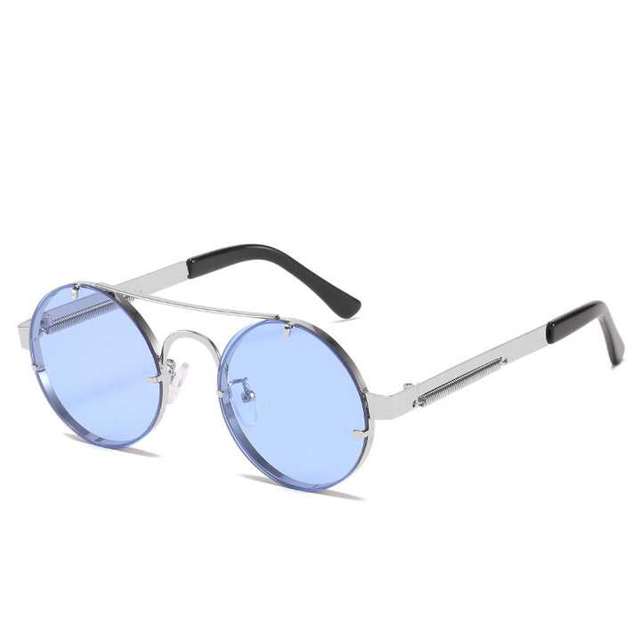 Dame rund designer solbrille med innovativ metallramme og beskyttende linser Skanto