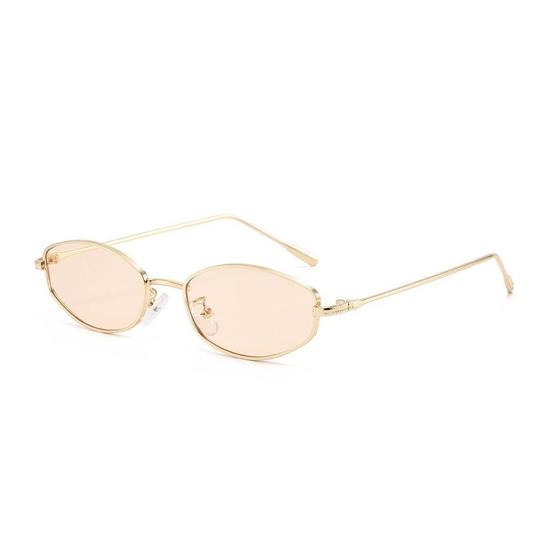 Dame moteriktig solbrille i minimalistisk ovalt design Skanto
