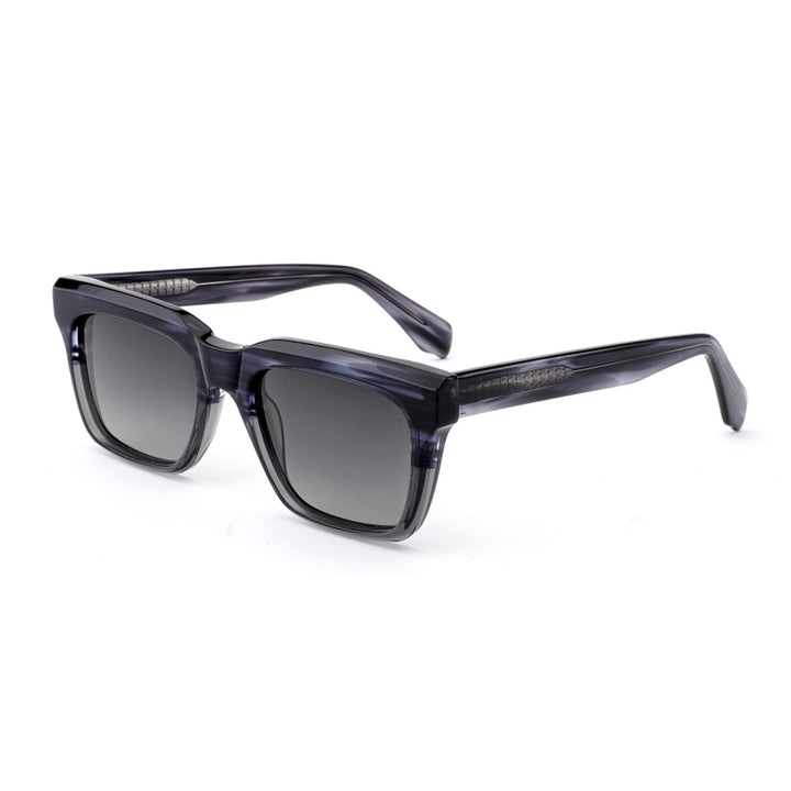 Dame moteriktig solbrille i elegant rektangulært design med robust ramme og UV-beskyttelse Skanto