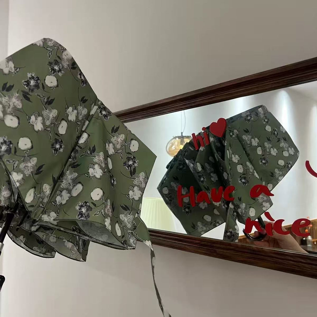 Dame Faltparaply med stilfullt blomsterdesign Skanto