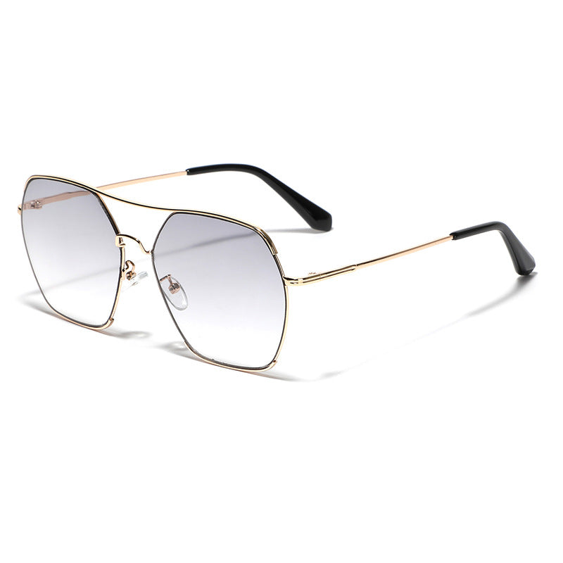 Damer oversized fashion solbriller med elegant metallramme Skanto