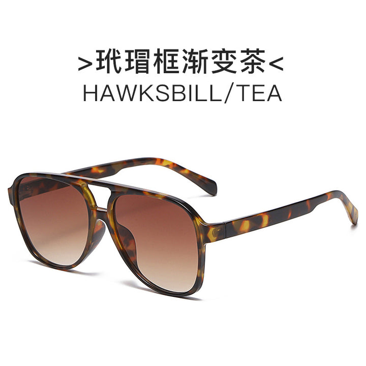 Dame elegant solbrille med høyverdig geometrisk design Skanto