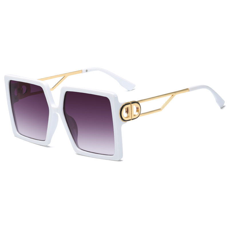 Dame oversized firkantet solbrille med elegant metallramme og polariserte glass Skanto