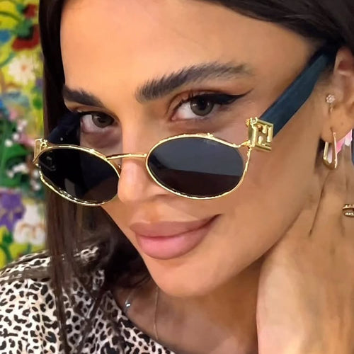 Dame moter solbrille med elegant metallramme og UV-beskyttelse Skanto