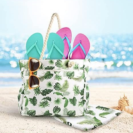 Strandveske med botanisk motiv og robuste taustropper Skanto