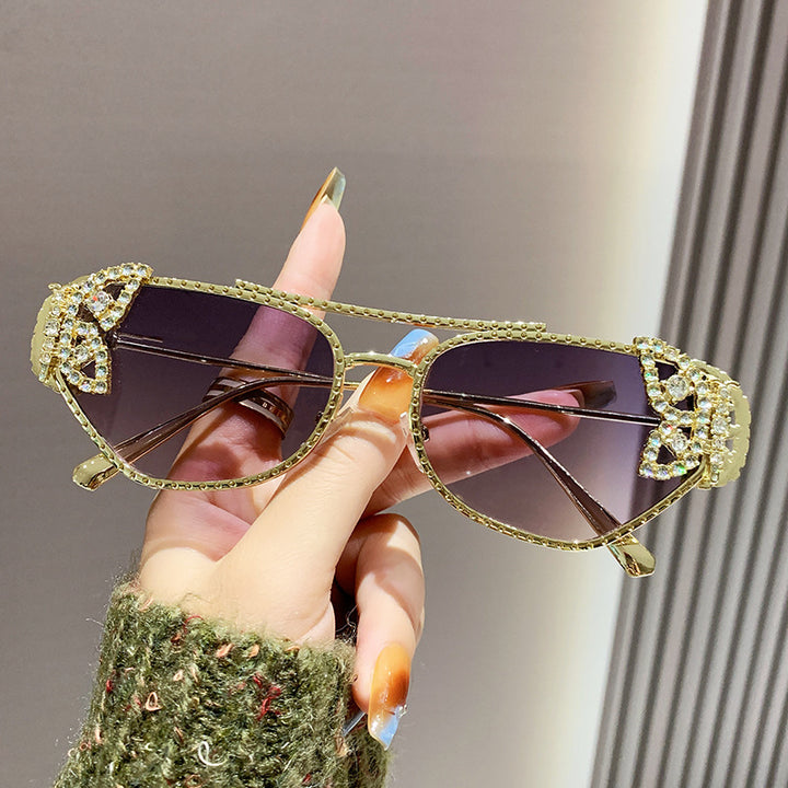 Dame luksus solbrille med elegant sommerfugl-detalj Skanto