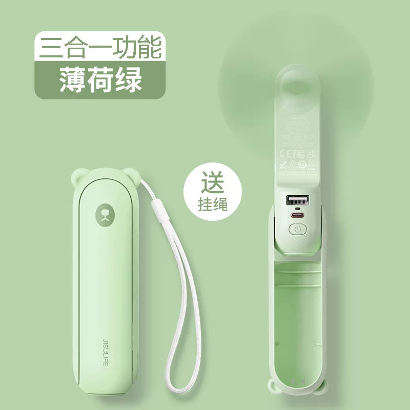 Unisex en størrelse sammenleggbar oppladbar trippel håndholdt mini vifte med innebygd powerbank USB-C og USB-A tilkoblinger samt håndleddsstropp Skanto