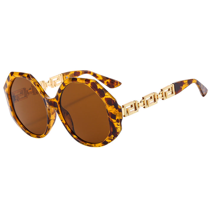 Dame oversized solbrille med iøynefallende oktagonal design Skanto