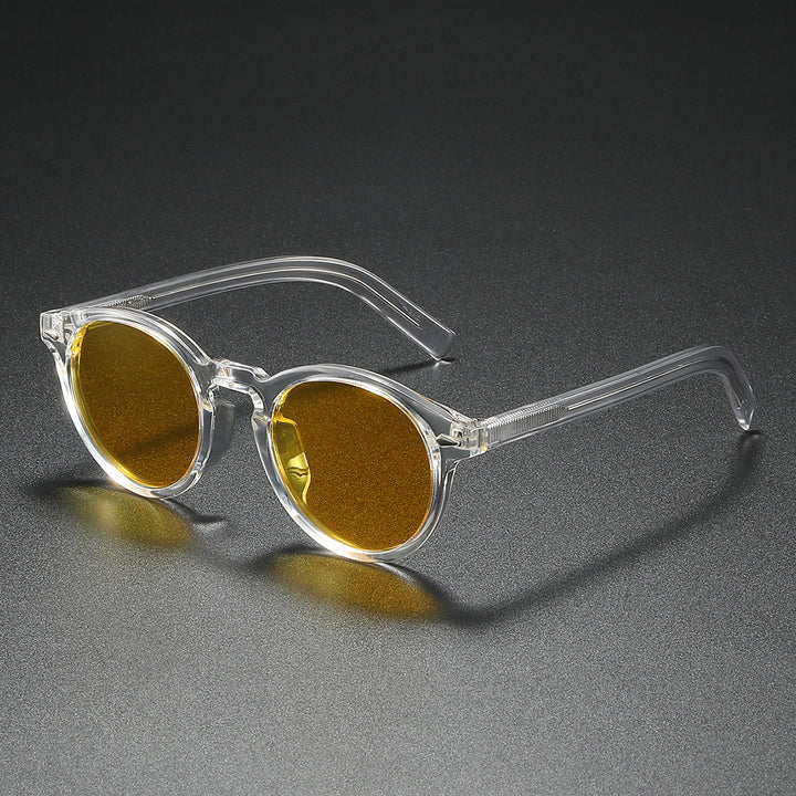 Dame Rund-solbrille med transparent ramme og reflekterende glass Skanto