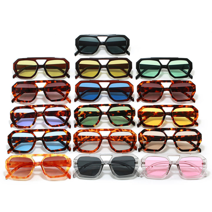 Dame geometrisk solbrille i ekstravagant design Skanto