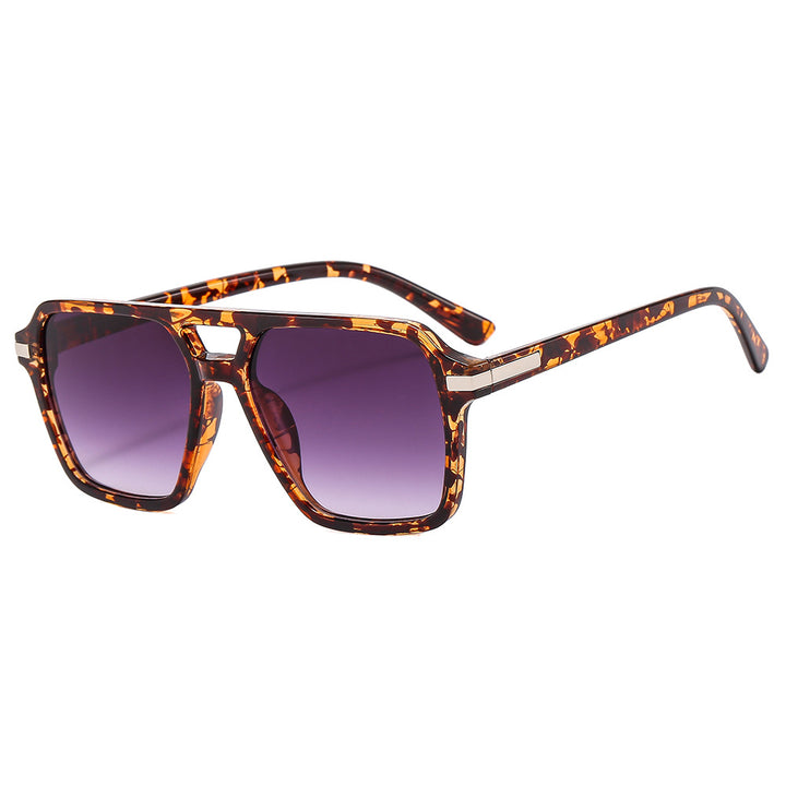 Dame Premium solbrille med moderne kvadratisk form Skanto