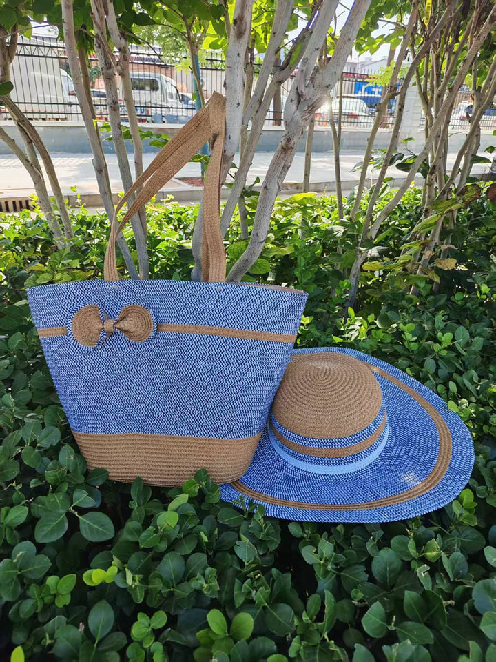 Elegante solhatt med bred brem og diskret stripemønster Skanto