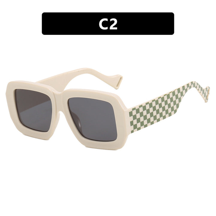 Dame moterik solbrille med kvadratisk design og stilig mønster Skanto