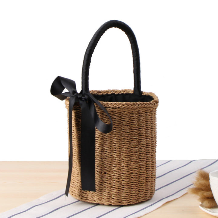 Modern basket bag with decorative satin ribbon Skanto