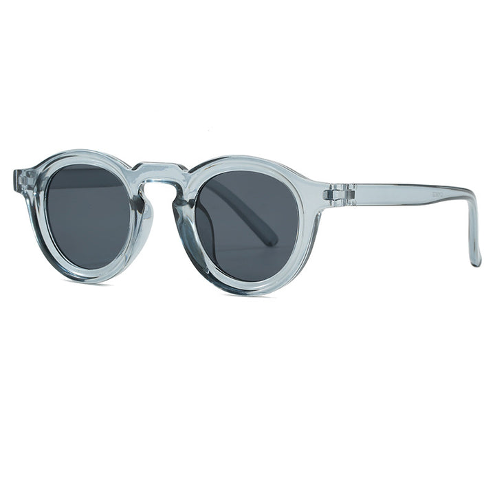 Damer fashionable runde solbriller med transparent ramme og UV-beskyttelse Skanto