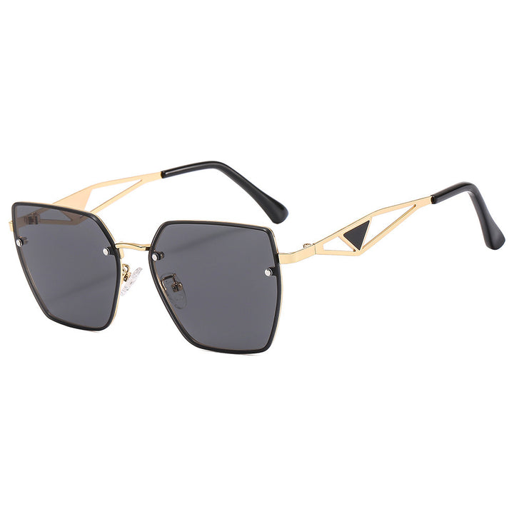 Dame geometrisk solbrille med filigran design Skanto