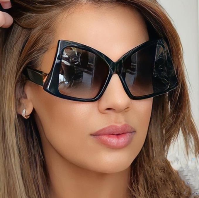 Damer oversized solbriller med elegant kvadratisk ramme og beskyttende UV-beskyttelse Skanto