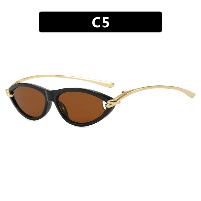 Damen Cat-Eye solbriller med elegant metallramme og beskyttende UV-filter Skanto