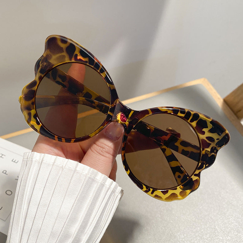 Dame Cat-Eye solbriller med unik rammeform og UV-beskyttelse Skanto