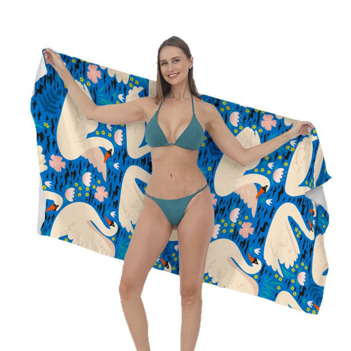 Strandhåndkle med kreative surf-motiver Skanto