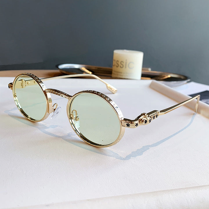 Dame Elegant solbrille med filigran detaljer Skanto