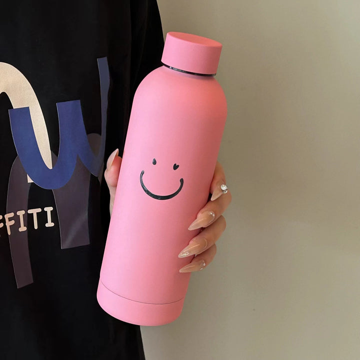 Dame isoleringsflaske med lyst smilendesign Skanto