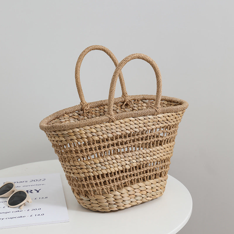 Håndlaget rattan-veske med en avtakbar innleggsfôr Skanto