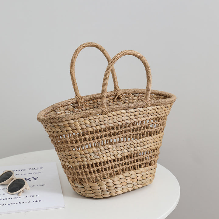 Håndlaget rattan-veske med en avtakbar innleggsfôr Skanto