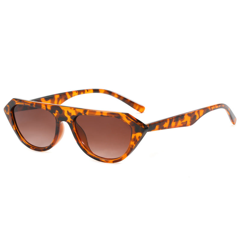 Dame moteriktig asymmetrisk solbrille Skanto