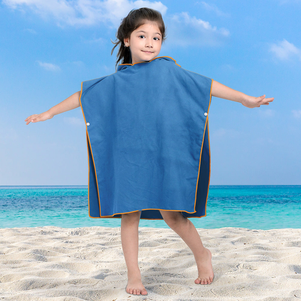 Jente badeponcho Skanto