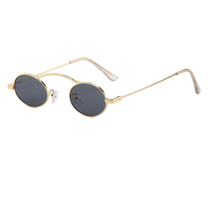 Dame moteriktig solbrille med unike sirkulære rammer og karakteristiske linser Skanto