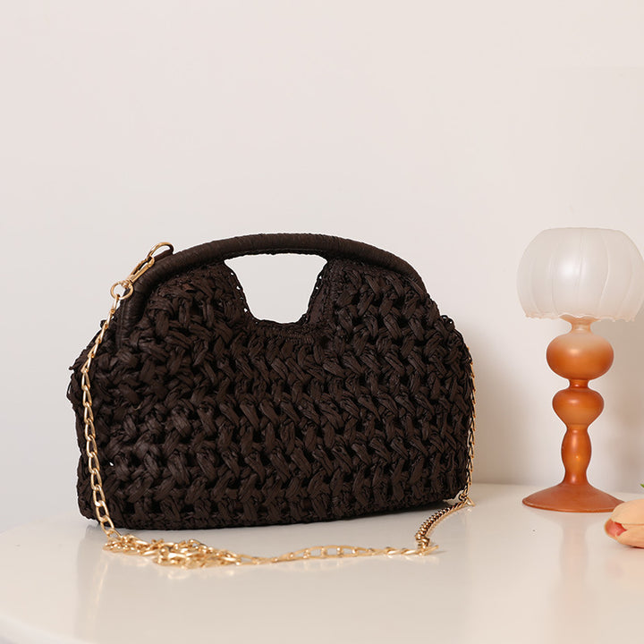 Håndlaget rattantur med elegante håndtak og kedekontakter Skanto