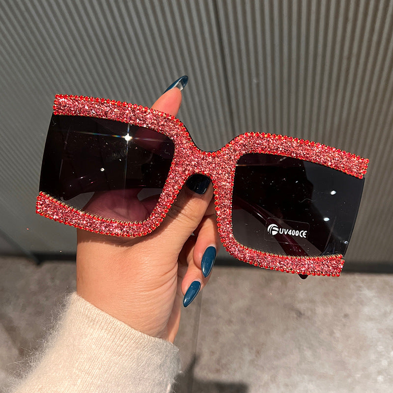 Dame solbrille med strassdekorert ramme Skanto