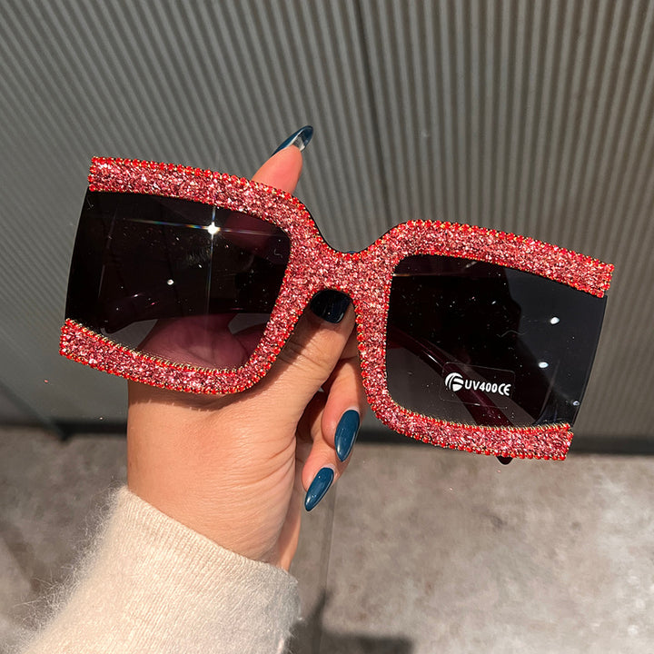 Dame solbrille med strassdekorert ramme Skanto