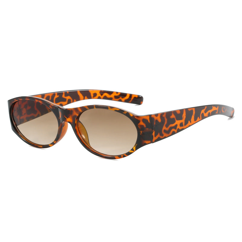 Dame motesolbrille med elegant, oval design og UV-beskyttelse Skanto
