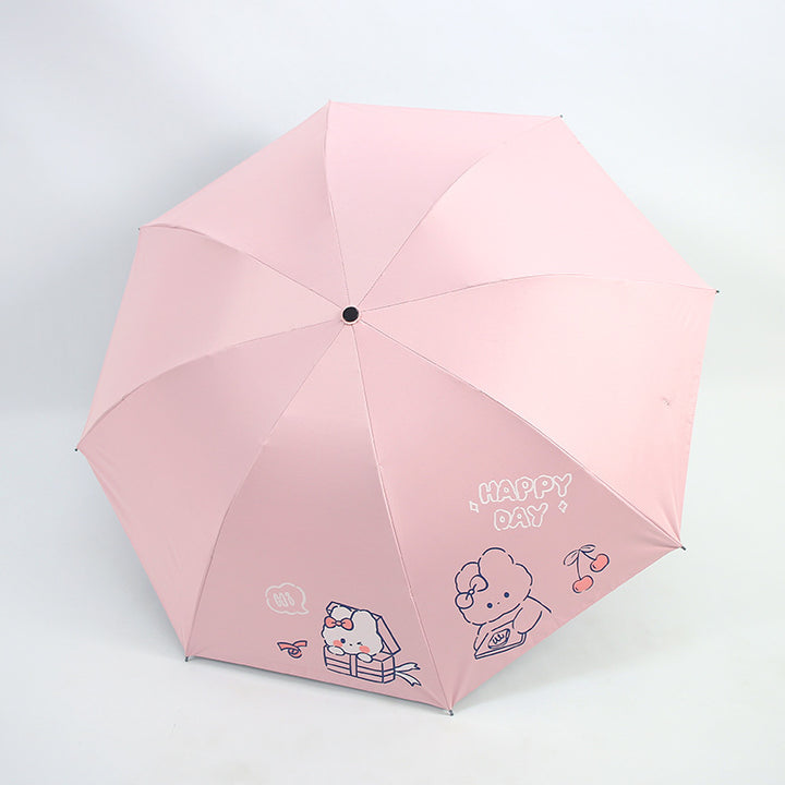 Damefoldingparaply med leken design og munter Skanto motiv