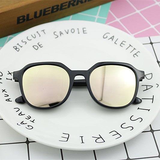 Dame moterik solbrille i elegant, åttekantet design Skanto
