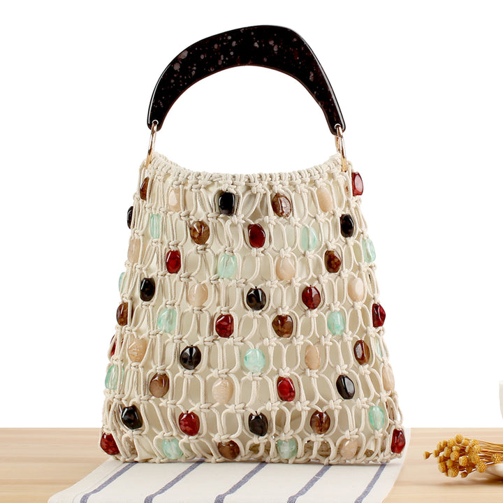 Handbag with colorful jewelry element Skanto
