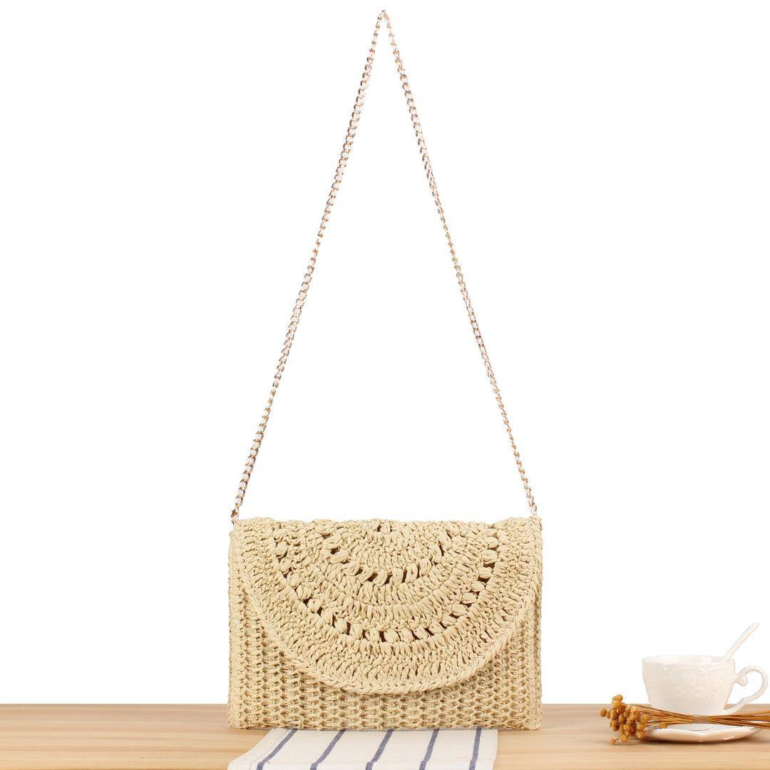 Woven Raffia Handbag with Elegant Chain Detail Skanto