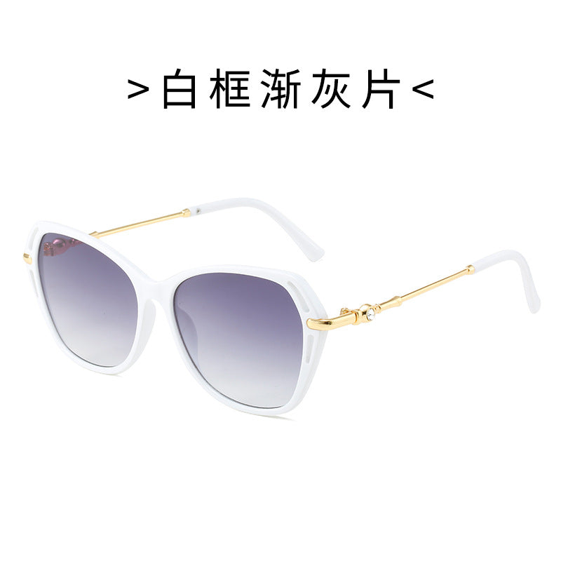 Dame moter Cat-Eye solbrille med elegant metallramme Skanto