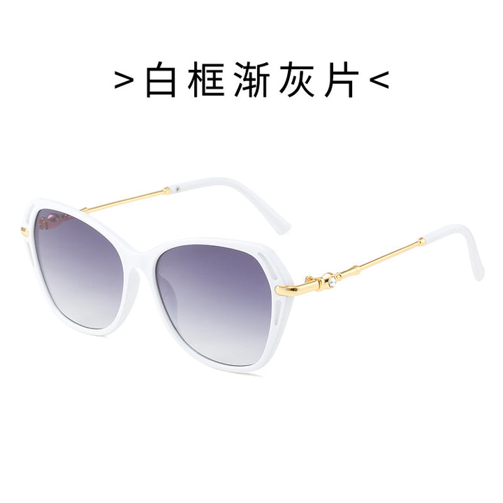 Dame moter Cat-Eye solbrille med elegant metallramme Skanto